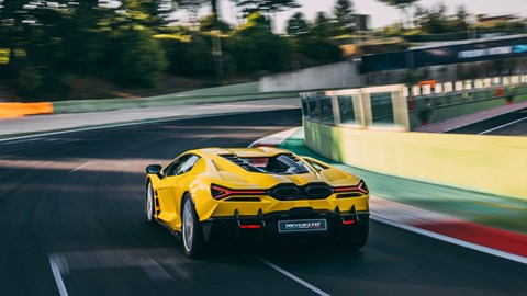 Lamborghini Revuelto rear three-quarter driving