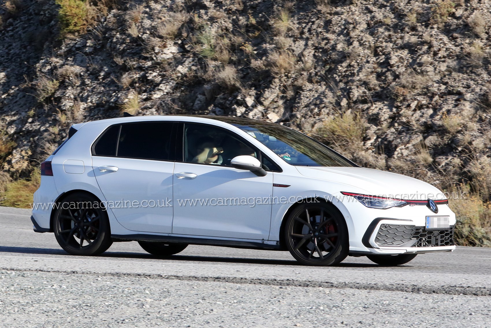 2024 Volkswagen Golf facelift spied with new look, super-sized screen -  Drive