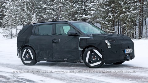 Kia EV3 pre-production prototype, spy shot, front side view, driving in the snow