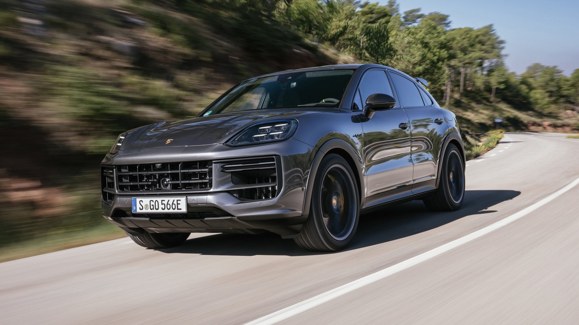 Porsche Cayenne Coupe review - 2023 facelift - Turbo E-Hybrid with GT Package, grey, front, driving