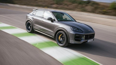 Porsche Cayenne Coupe review - 2023 facelift - Turbo E-Hybrid with GT Package, grey, front, driving on circuit