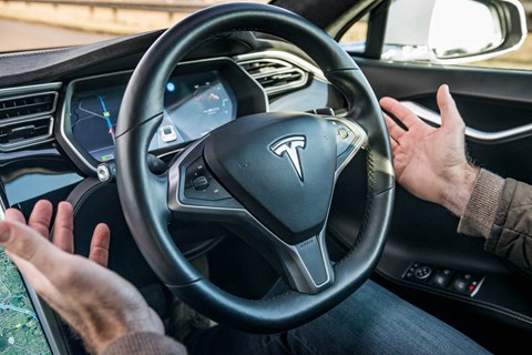 Look no hands: Tesla self-driving tech in action