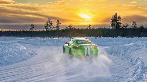 Air-cooled Porsche 911 ice-driving experiences, Cayman R drifting on frozen lake, green, rear