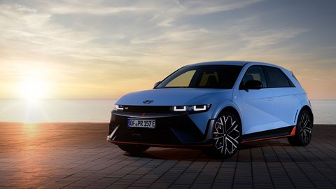 Hyundai Ioniq 5 N (2024) review: front three quarter static, blue paint, sunset by the sea