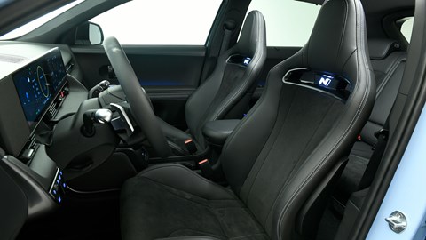 Hyundai Ioniq 5 N (2024) review: front sports seats and dashboard, black upholstery