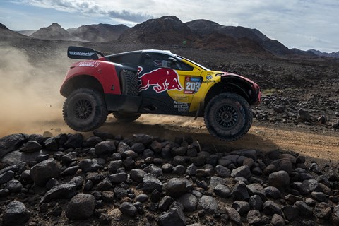 Bahrain Raid Xtreme's French driver Sebastien Loeb and his Belgian co-driver Fabian Lurquin on Stage 8 of the 2024 Dakar Rally (Getty)