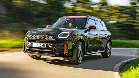 Mini Countryman JCW review - front view, black, driving round corner