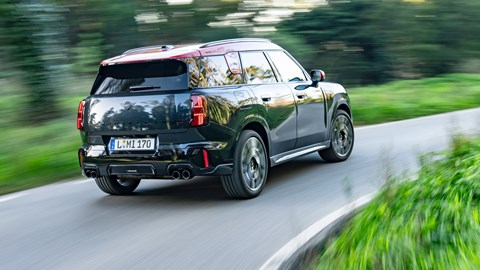 Mini Countryman JCW review - rear view, black, driving round corner