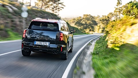 Mini Countryman JCW review - rear view, black, driving up road