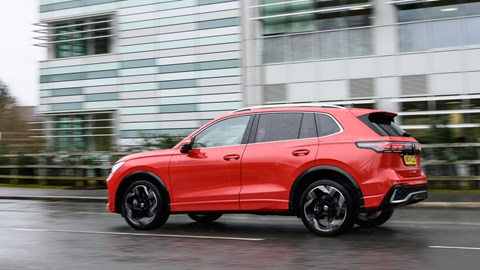 VW Tiguan review - R-Line 265, rear side, driving, Persimmon Red, Bauer Media exclusive image
