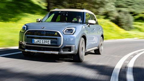 Mini Countryman Electric review - SE ALL4, front, blue, driving round corner
