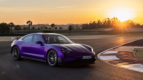 Porsche Taycan Turbo GT review - Purple Sky Metallic, Weissach package, front view, parked at apex at sunset