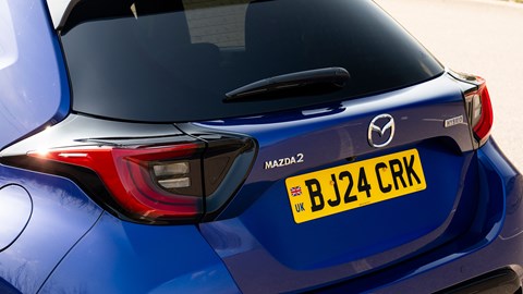 Panel between lights changed for facelifted 2024 Mazda 2 Hybrid