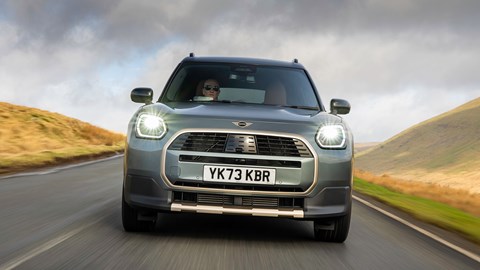 MINI Countryman (2024) review: front driving, British B-road, silver and gold paint