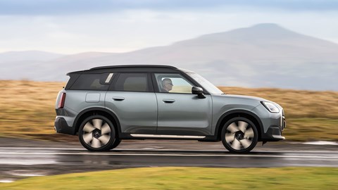 MINI Countryman (2024) review: side view driving, British B-road, silver and gold paint