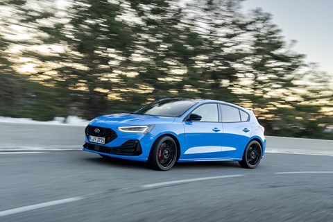 2024 Ford Focus ST Edition, blue, front left three-quarters, driving