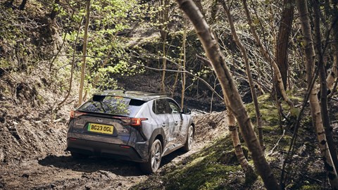 Subaru Solterra, grey, rear, off-road driving