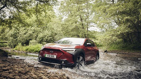 Subaru Solterra, red, front, fording river
