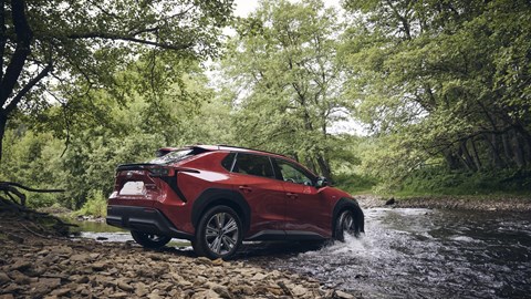 Subaru Solterra, red, rear, fording river