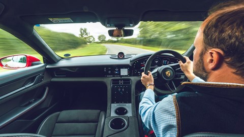 Keeper Piers Ward drives his Porsche Taycan