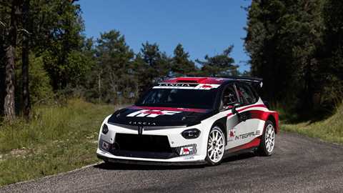 Image of the Lancia Ypsilon Rally2 HF Integrale, viewed from the front, going round a right-hand corner