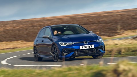 Volkswagen Golf R, front three quarter driving, country road, blue paint