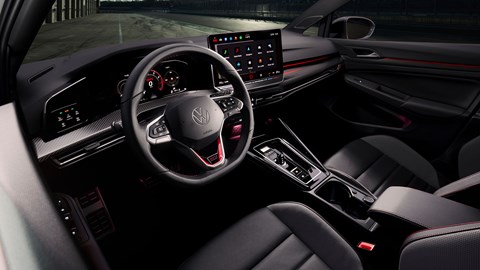 Volkswagen Golf GTI Clubsport facelift: dashboard and infotainment system, from driver's door, black upholstery