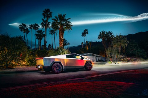 Tesla Cybertruck in Palm Springs: overhead, a SpaceX rocket blasting into orbit