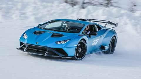 Election manifestos 2024: a blue Lamborghini Huracan doing a skid in the snow, (representing the Conservative party)