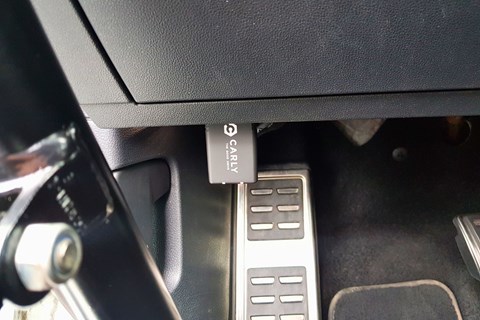 The Carly OBD II scanner installed in a car 