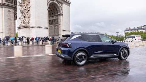 Renault's new Scenic passes the Arc de Triomphe