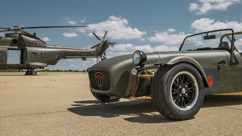 Caterham Seven 360R built with parts from RAF Puma HC2 helicopter - front, close, with helicopter