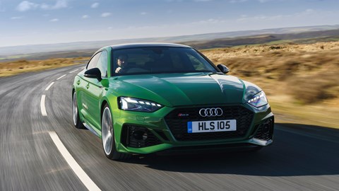 Audi RS5 Sportback: front three quarter driving, low angle, green paint