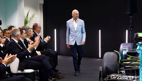 Adrian Newey next to the audience and F1 car