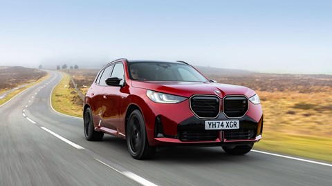 BMW X3 (2024) review: front three quarter cornering, red paint