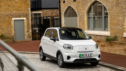 Leapmotor T03 (2025) review: front three quarter static, buildings in background, white paint