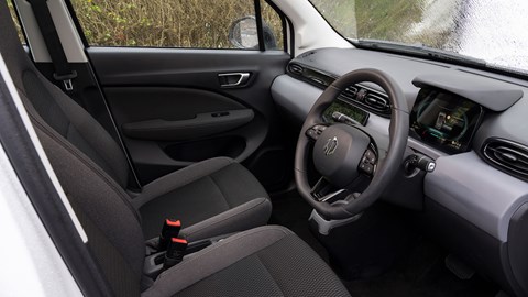 Leapmotor T03 (2025) review: drivers seat and steering wheel, Leapmotor T03 (2025) review: drivers seat and steering wheel, black and grey upholstery