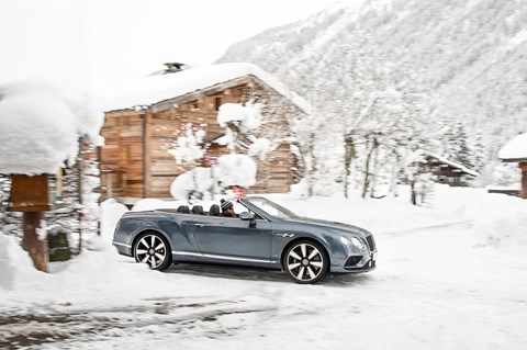 Bentley Continental GT Convertible side tracking snow
