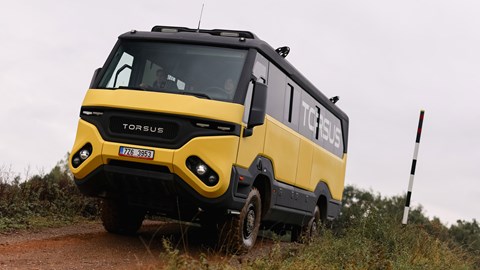 Torsus Praetorian review - front, yellow, driving offroad
