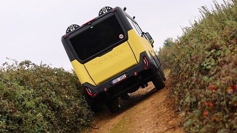 Torsus Praetorian review - dead-on rear, yellow, going up a slope