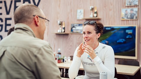 Image of writer Graham King in conversation with Porsche Carrera Cup GB driver Abbie Eaton