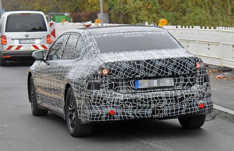 Rear of new 2026 BMW i3 still heavily disguised