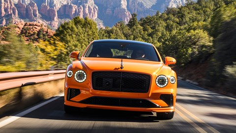 Bentley Flying Spur Speed review - dead-on front, Mandarin orange, driving