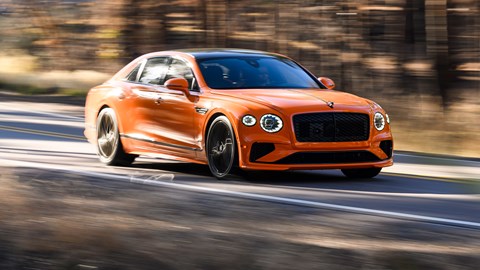 Bentley Flying Spur Speed review - front, Mandarin orange, driving round corner