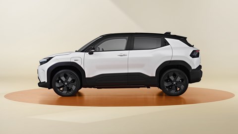 Image of the Toyota Urban Cruiser, in white, viewed from the left side