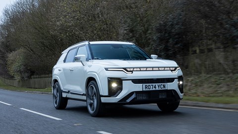 KGM Actyon (2025) review: front three quarter driving, low angle, white paint