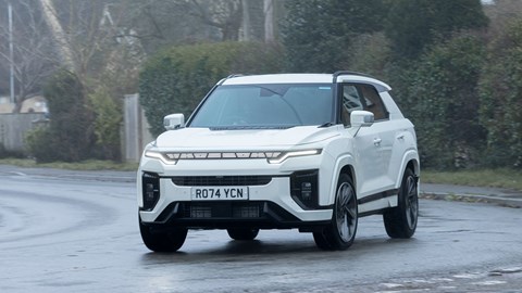 KGM Actyon (2025) review: front three quarter cornering, white paint, wide angle