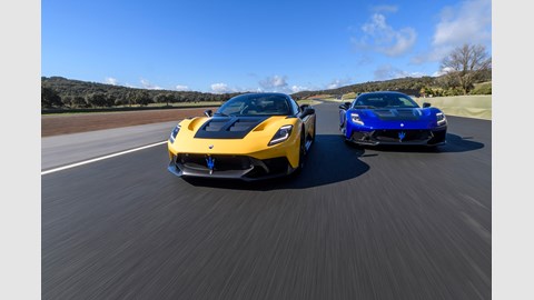 Two Maserati GT2 Stradales on track