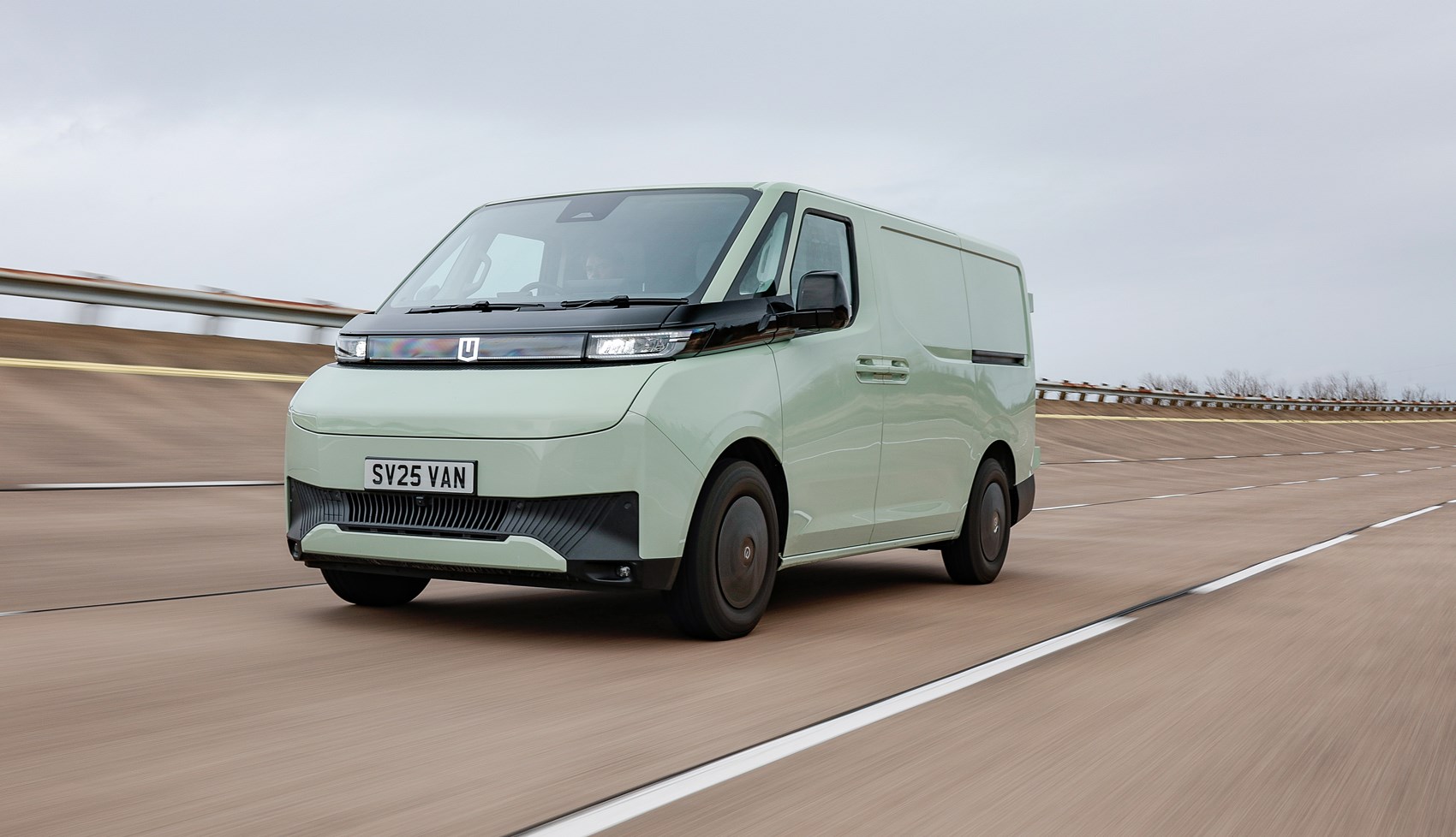 Rear view of the Farizon SV van with lights on.