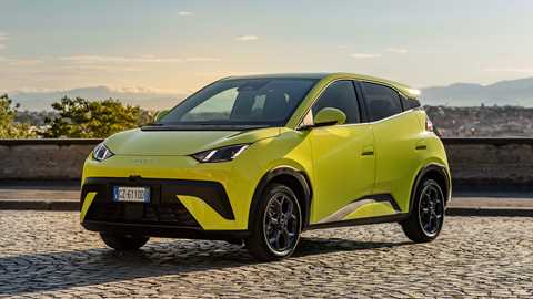 BYD Dolphin Surf (2025): front three quarter static, low angle, green paint